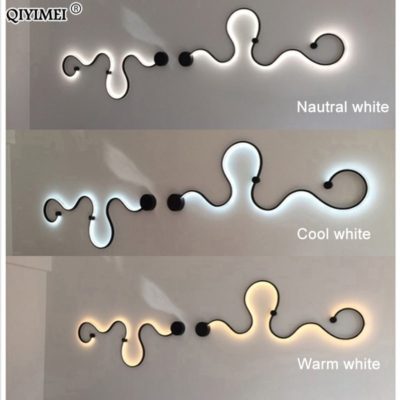 Lámpara de pared crea finas líneas de luz que recorren las paredes